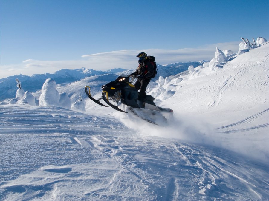 Snowmobile safari in Lapland wilderness